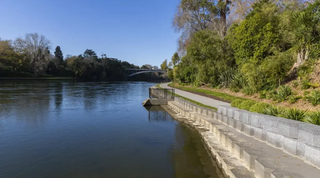Waikato River walkway in Hamilton under a clear sky